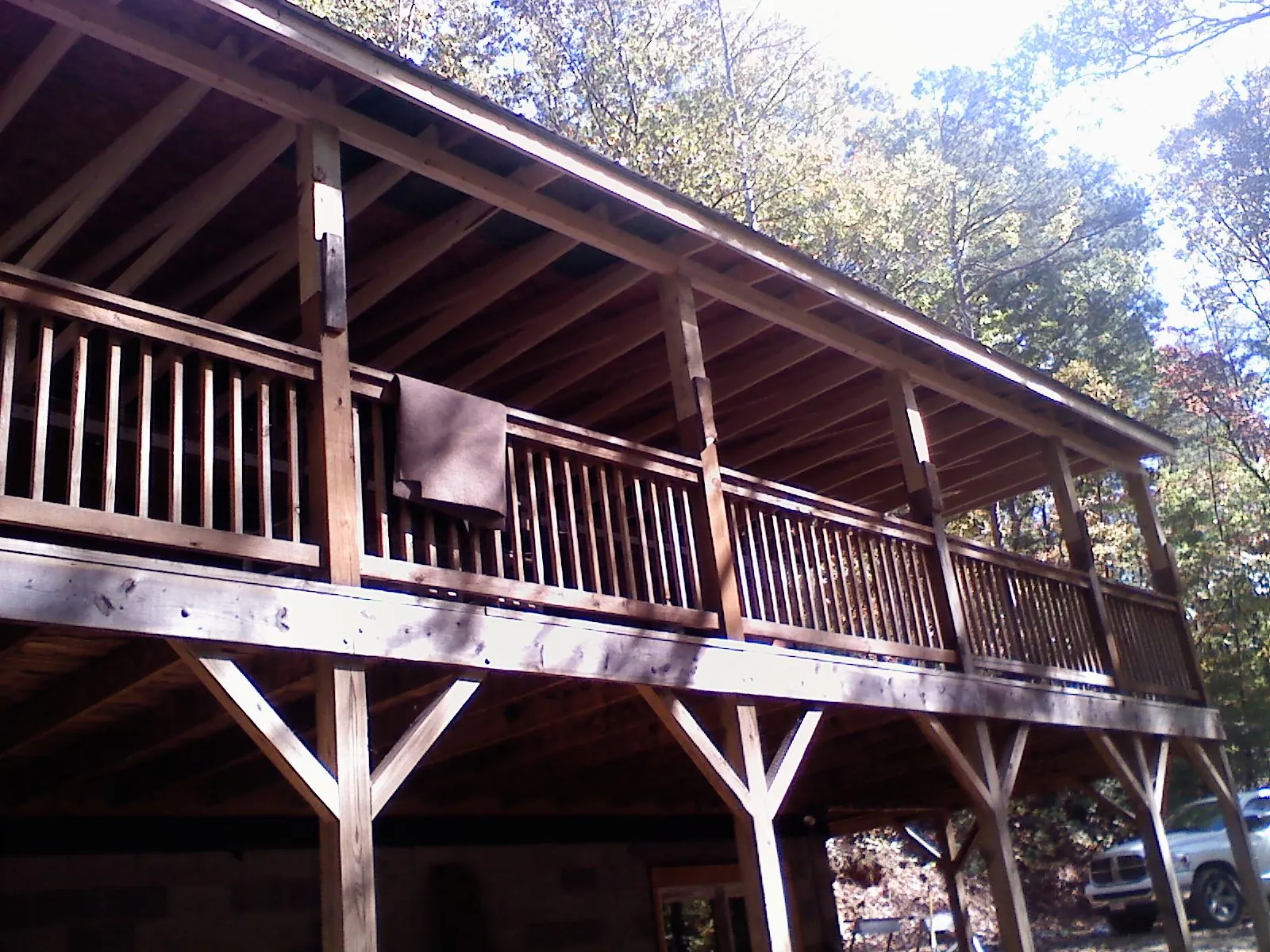 Timber framing under a new elevated porch and deck — Roof Leak Repair in Bethel by Roofing Brothers